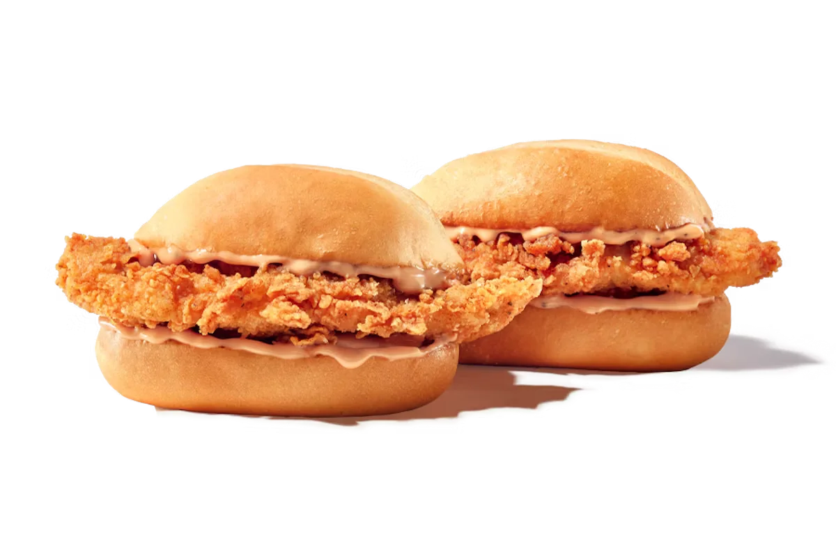 Zaxby's 2 Nibblerz® – Two hand-breaded Chicken Fingerz™ with Zax Sauce® on toasted buns.
