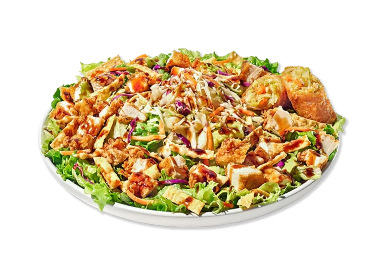 Zaxby’s Asian Zensation Zalad™ featuring hand-breaded chicken, freshly chopped greens, crispy wonton strips, red cabbage, carrots, and Asian-style dressing with a citrus vinaigrette.
