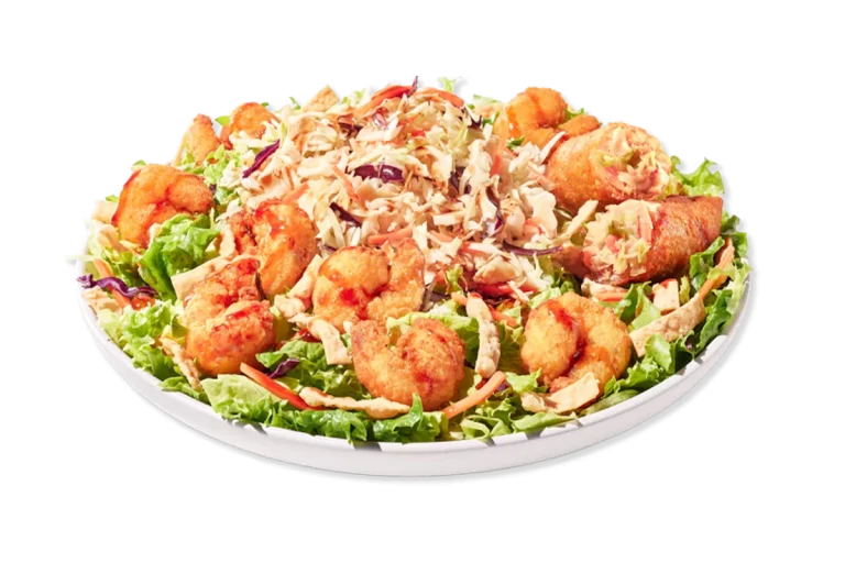 Zaxby’s Asian Zensation Zalad™ with Southern Fried Shrimp topped with crispy wonton strips, served with citrus vinaigrette and an egg roll on the side.