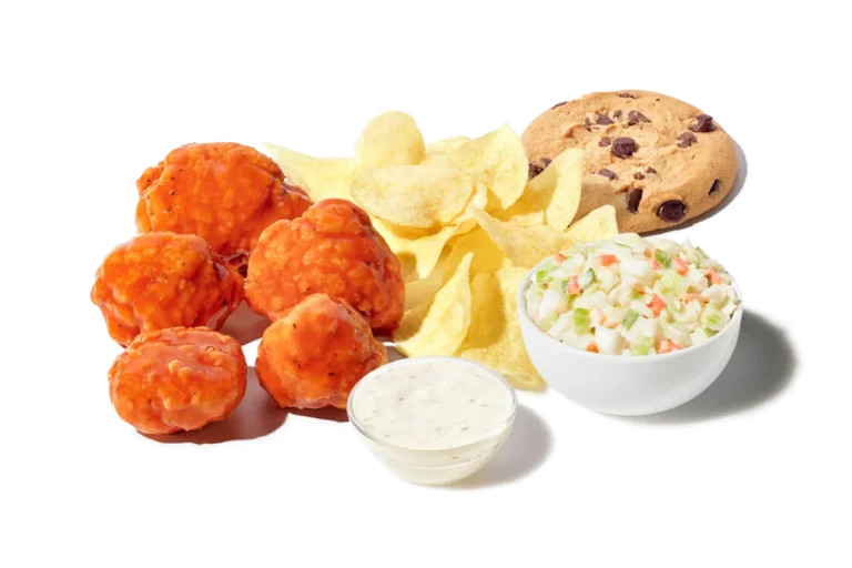Zaxby's Boneless Wings Boxed Lunch, featuring 5 boneless wings tossed in your choice of sauce, served with Ranch dipping sauce, chips, cole slaw, and a chocolate chip cookie.