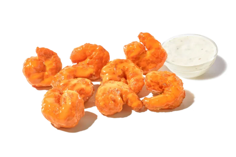 Zaxby's Buffalo Shrimp, featuring crispy shrimp tossed in spicy buffalo sauce, served with your choice of dipping sauce.