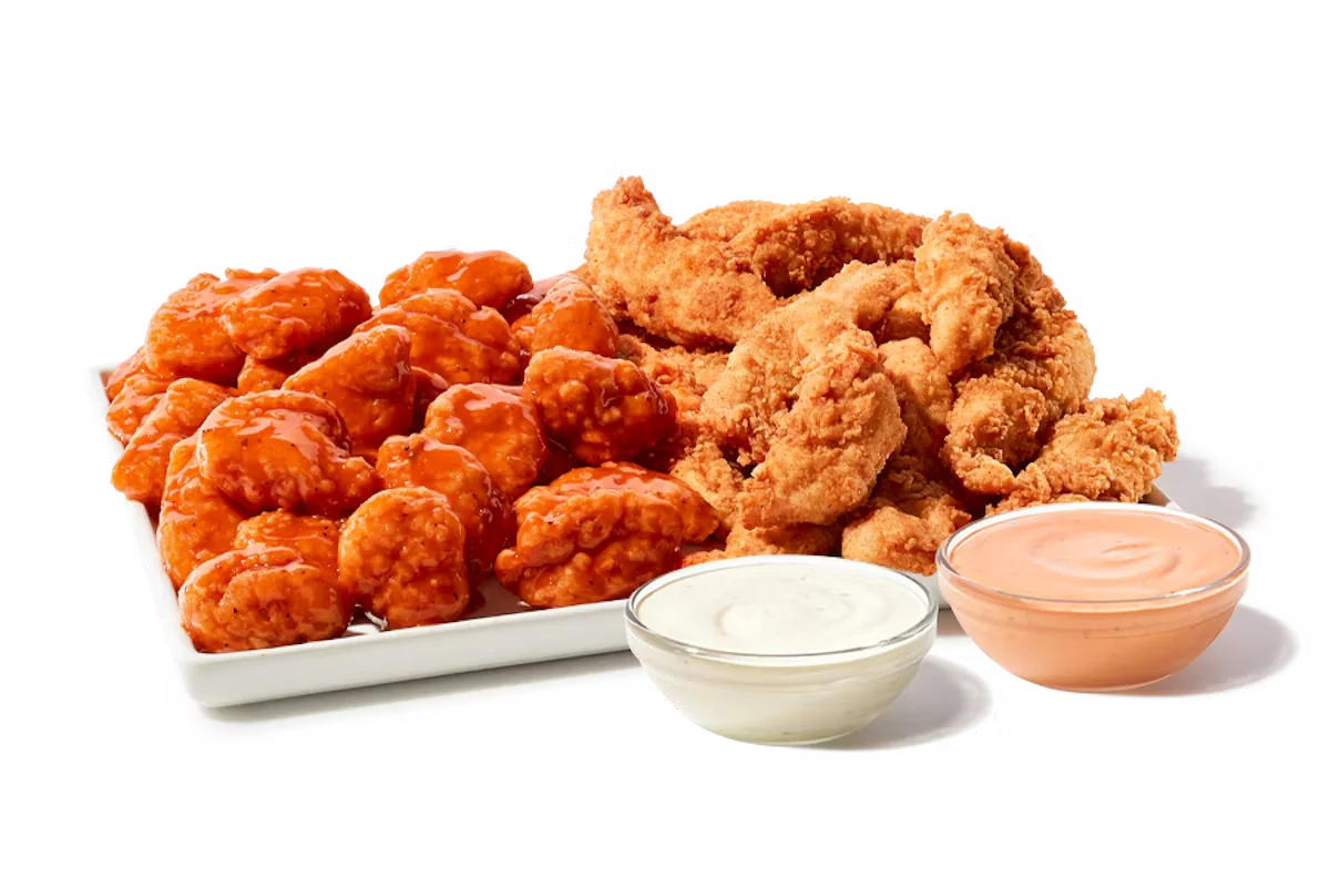 Zaxby's Chicken Fingerz™ and Boneless Wings Zampler Platter, featuring 20 hand-breaded Chicken Fingerz™ and 30 Boneless Wings tossed in your choice of sauce, served with Zax Sauce® and Ranch dipping sauces.