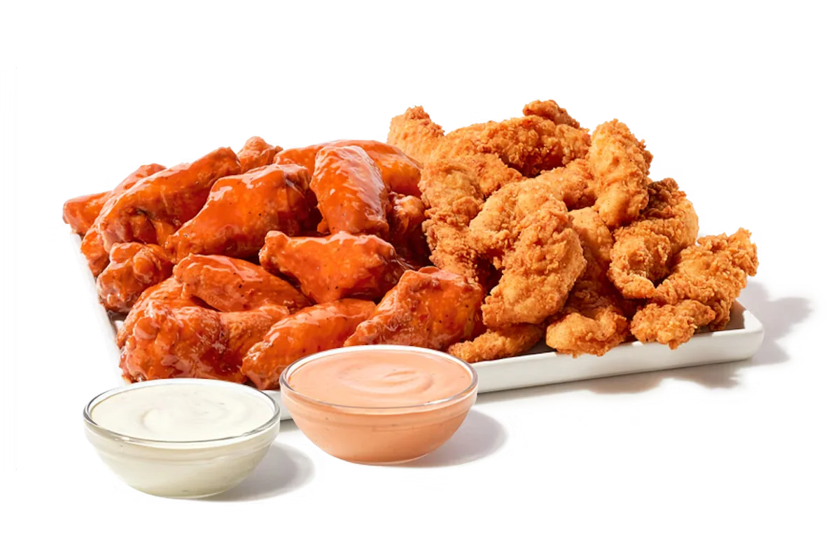 Zaxby's Chicken Fingerz™ and Traditional Wings Zampler Platter, featuring 20 hand-breaded Chicken Fingerz™ and 20 traditional wings tossed in your choice of sauce, served with Zax Sauce® and Ranch dipping sauces.