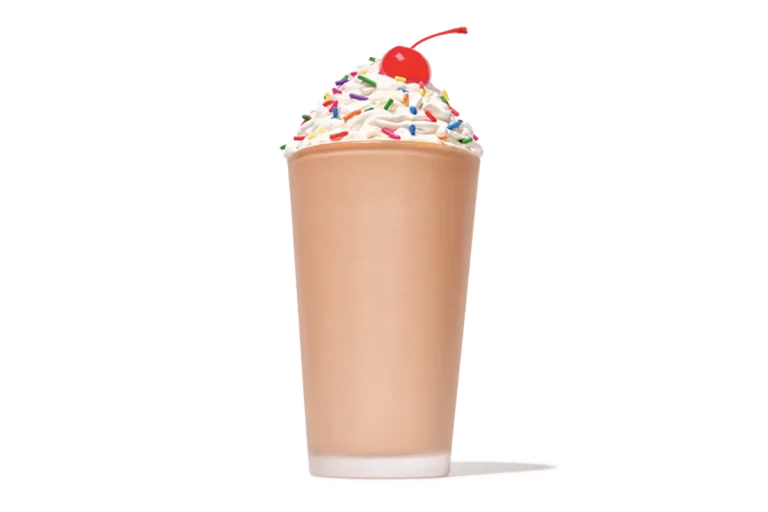 Zaxby's Chocolate Milkshake, a creamy milkshake blended with rich chocolate flavor, topped with whipped cream and a chocolate drizzle.