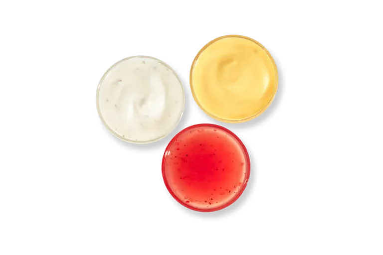 Zaxby's Extra Dressing, featuring a variety of flavorful salad dressings like Ranch, Blue Cheese, and more.