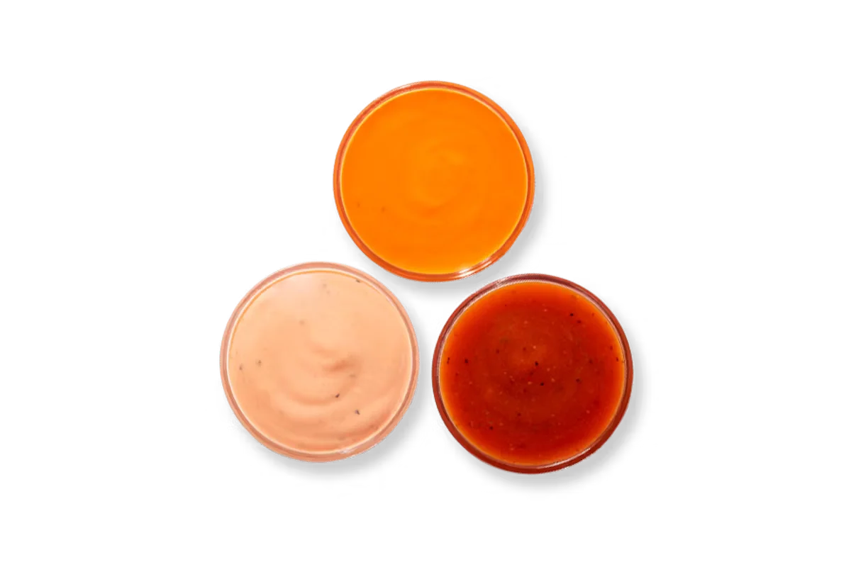 Zaxby's Extra Sauce, featuring a variety of flavorful dipping sauces like Zax Sauce®, Ranch, and more.