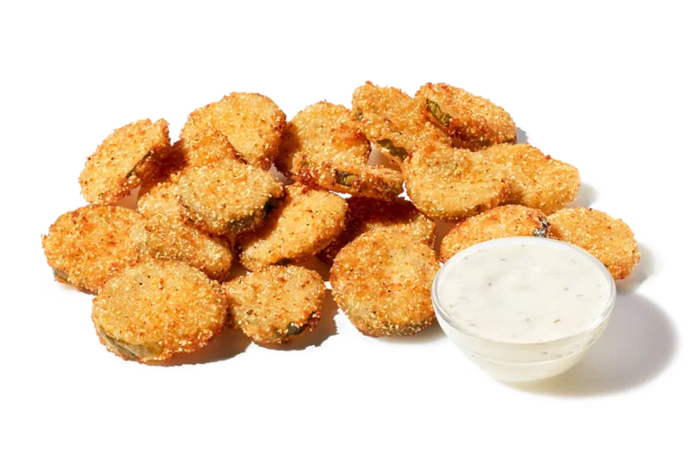 Zaxby's Fried Pickles, featuring crispy, battered pickle slices served with a side of ranch dipping sauce.