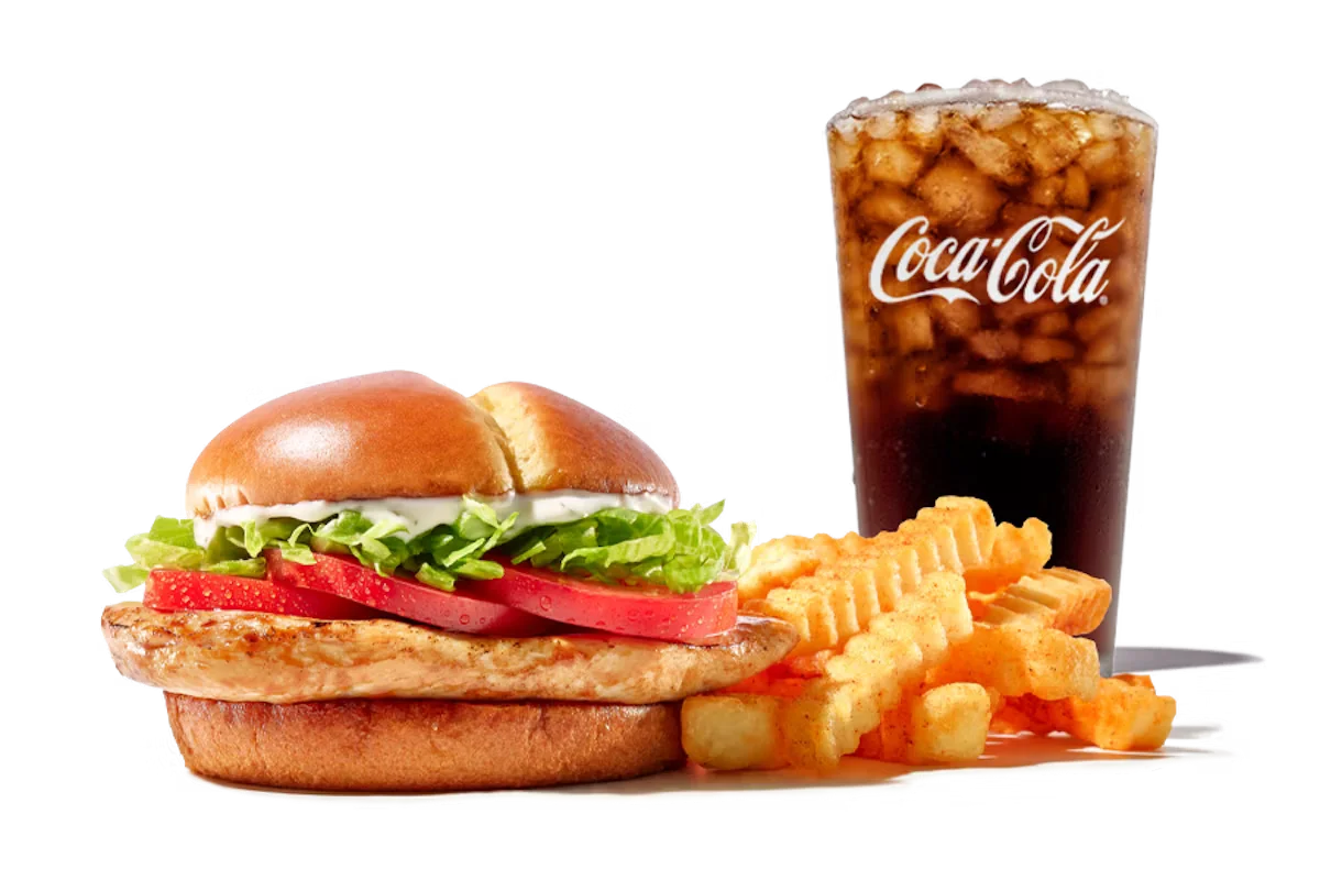 Zaxby's Grilled Chicken Sandwich, featuring a tender grilled chicken fillet with pickles and mayo on a toasted bun.