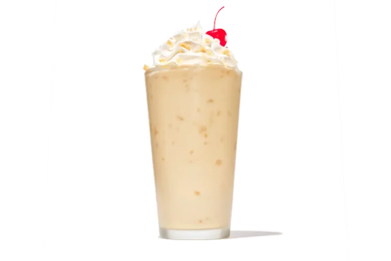 Zaxby's Salted Caramel Milkshake, a creamy milkshake topped with whipped cream and a caramel drizzle for a sweet, indulgent treat.