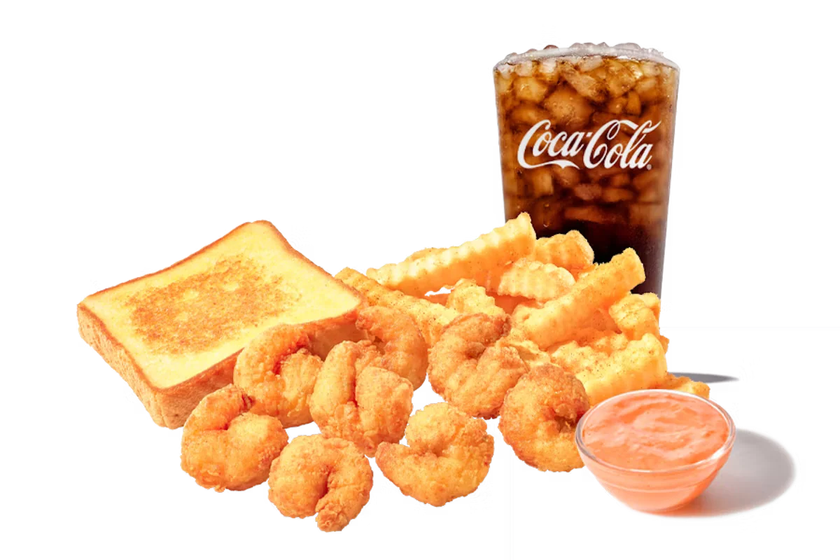Zaxby’s Southern Fried Shrimp Meal featuring golden fried shrimp, crispy crinkle fries, Texas Toast, and Zax Sauce for dipping.