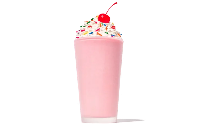 Zaxby's Strawberry Milkshake, a creamy milkshake blended with fresh strawberry flavor, topped with whipped cream and a strawberry drizzle.