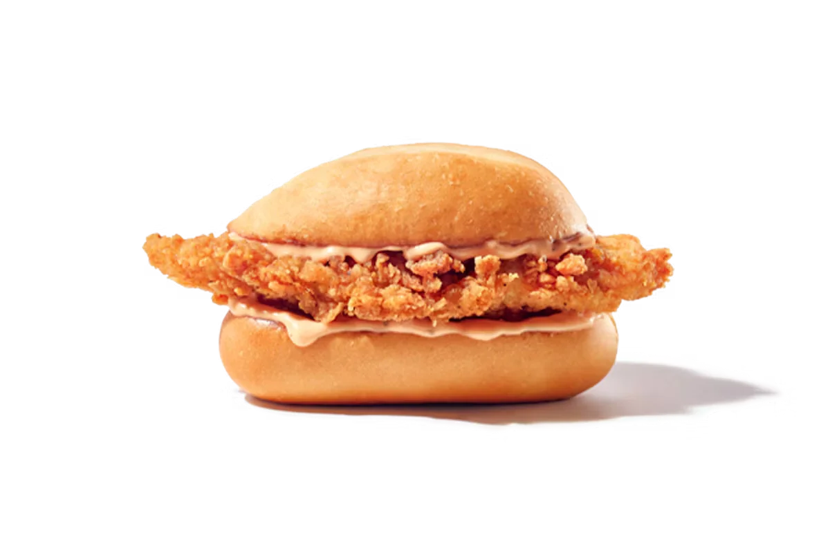 Zaxby's The Nibbler, featuring a hand-breaded Chicken Finger with Zax Sauce® on a toasted bun.