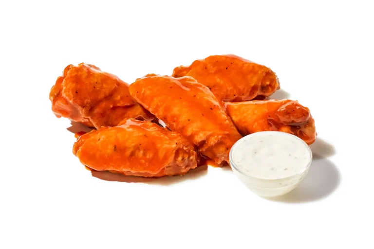 Zaxby's Traditional Wings, featuring crispy bone-in wings tossed in your choice of signature sauces, served with a side of ranch dipping sauce.