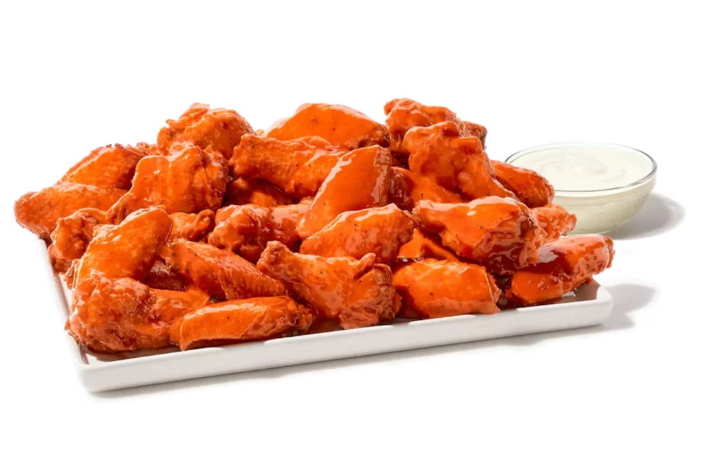 Zaxby's Traditional Wings Platter, featuring 40 traditional wings tossed in your choice of sauce, served with Ranch dipping sauce.