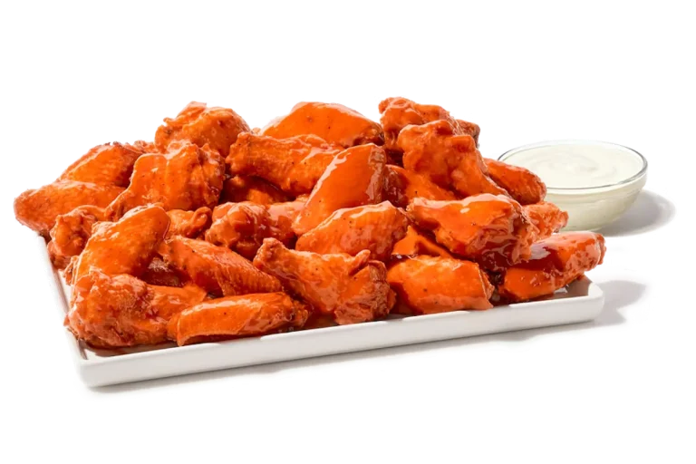 Zaxby's Traditional Wings Platter, featuring 40 traditional wings tossed in your choice of sauce, served with Ranch dipping sauce.