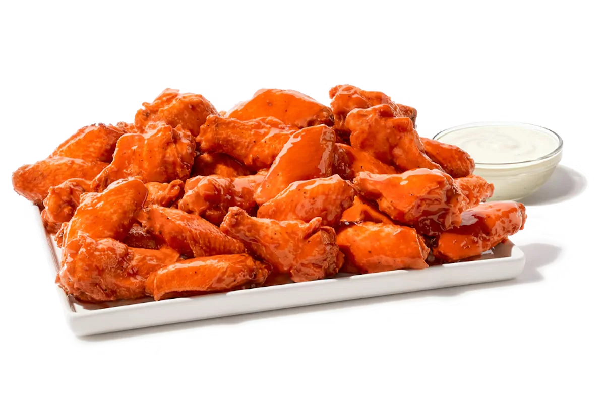 Zaxby's Traditional Wings Platter, featuring 40 traditional wings tossed in your choice of sauce, served with Ranch dipping sauce.