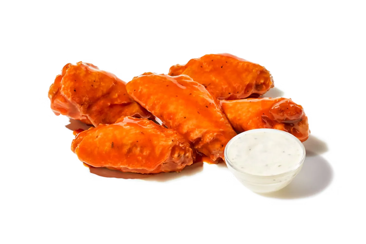 Zaxby's Traditional Wings, featuring crispy bone-in wings tossed in your choice of signature sauces, served with a side of ranch dipping sauce.
