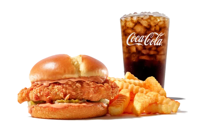 Zaxby's™ Spicy Signature Sandwich, featuring a spicy fried chicken fillet, pickles, and mayo on a toasted bun.